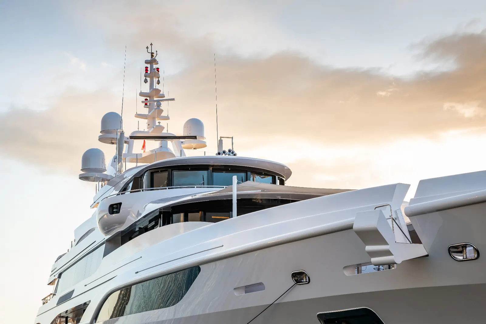 Luxury superyacht at sunset representing Gibraltar yacht registration