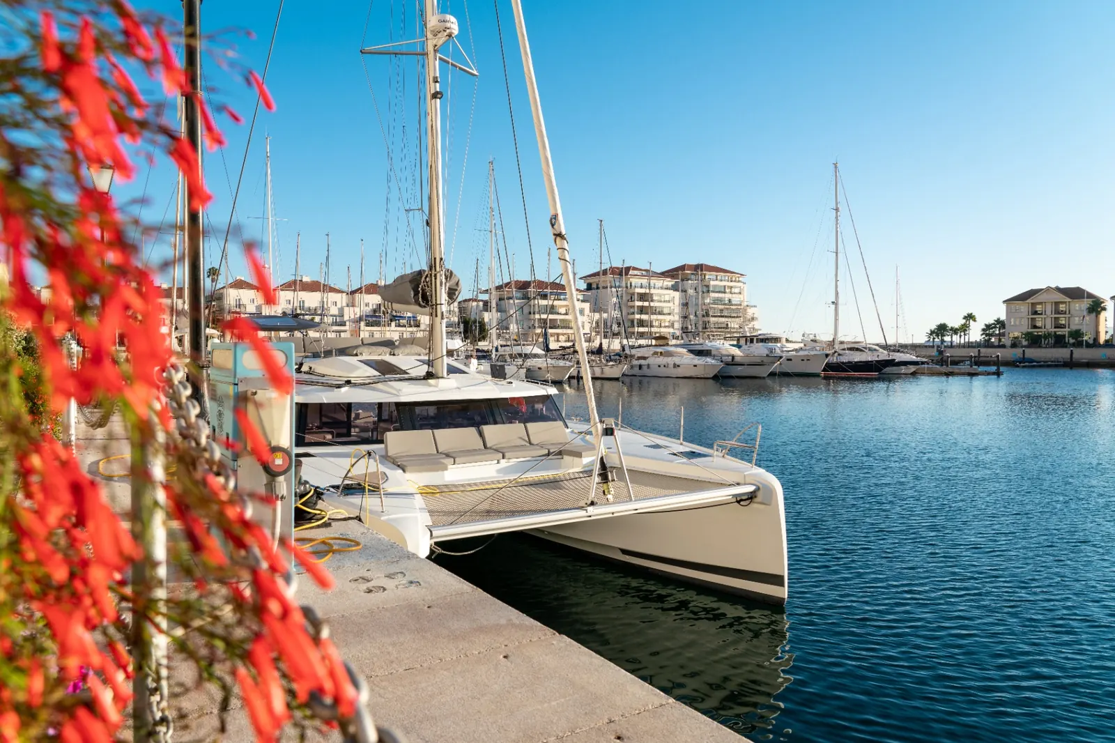 Luxury marina in Gibraltar with yachts and waterfront residences